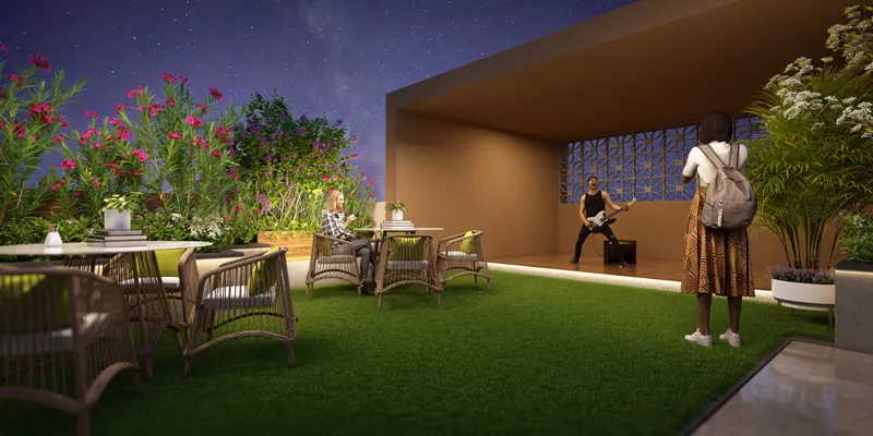 Rooftop party zone with pergola, lounge seating and evening lighting